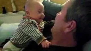 4 month old baby singing with grandad