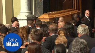 Heartbreaking scenes from the funeral of Jules Bianchi - Daily Mail