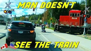 MOBILITY SCOOTER GOES THROUGH THE BARRIERS RIGHT WHEN THE TRAIN COMES