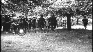 German prisoners being made to march by 82nd Division paratroopers in Normandy, F...HD Stock Footage