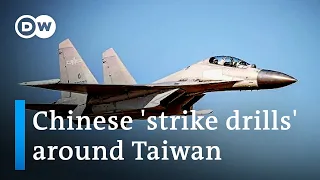 Over 70 Chinese warplanes cross Taiwan median in biggest incursion so far | DW News