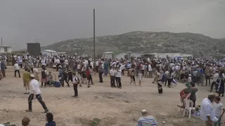 Israelis in mass march to claim evacuated West Bank settlement as their land