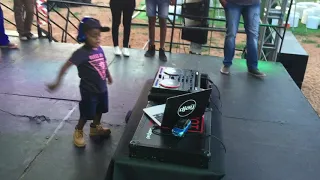 Baby DJ Arch Jnr Showing off His Dance Moves Whilst On The Decks.