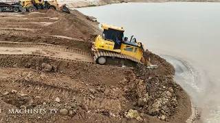 Skills Operator Bulldozer Moving Big Rock And Sand Wheel Loader Pushing Clearing To Backfill