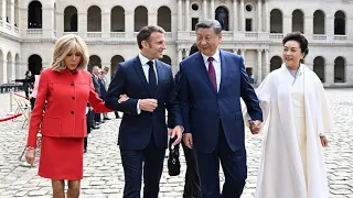 Chinese President Xi Jinping and his wife Peng Liyuan welcomed by France's Macrons at Elysee Palace