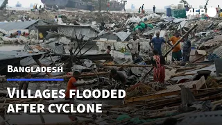 Villages flooded in Bangladesh after cyclone kills at least 16 | AFP