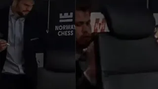 Magnus Carlsen Starts Signing the Chair After He Won the ARMAGEDDON Game Against Aryan Tari