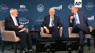 Former Presidents Bill Clinton and George W. Bush came together Monday to launch a new scholars prog