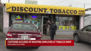 Customer accused of shooting employee at tobacco shop