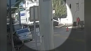 Light pole falls on truck in Miami Beach