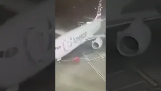 Strong winds push empty plane off tarmac in Dallas