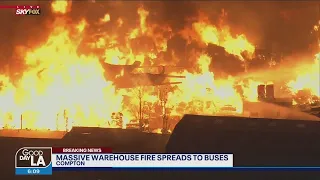 Massive fire burns in industrial area of Compton