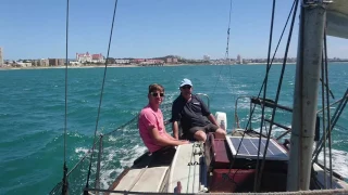 Sailing at hull-speed in a 25ft yacht.