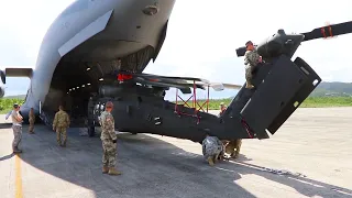 Loading UH-60 Blackhawk Helicopters into a C-17 Globemaster III Aircraft