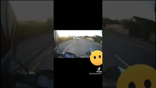 moped rider nearly got hit by bird