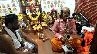 Guruji Sai Ishwar and kadri Gopalnath .A gift to guruji by playing a song through saxophone.