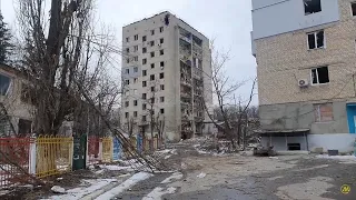 Damaged residential buildings and kindergarten. 6A Derevyanka St, 8 Derevyanka St. 2022-03-14