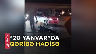 Bakıda kişi başının altına "yastıq" qoyub asfaltda uzandı – APA TV