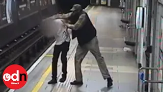 Shocking Footage Shows Moment Man Pushed onto Tube Train Tracks