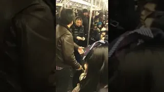 Western lady racist.. Shouting to Asian girl. On subway at America.. 2018