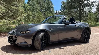 Spirited driving. Great sounding 2 liter MX-5 nd. West Platte, north of Pike's Peak. Late summer.