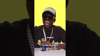 Bobby Shmurda struggles to open his peanuts 😂