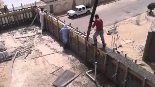 Pouring concrete on double door railing...