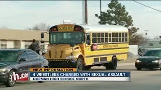 Four wrestlers charged with sexual assault