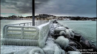 Frozen River Walk and huge amount of erosion on the lake shore drone footage