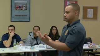 Police officers take course teaching de-escalation techniques