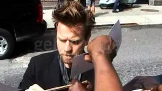 Ewan McGregor signs autographs for fans as he arrives at the 'Late Show With David Letterman'