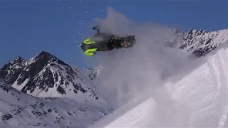 крутейшие виды природы и трюков на снегоходах в горах-stunts on snowmobiles