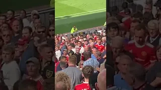 Manchester United fans fight each other during Man Utd vs Brighton