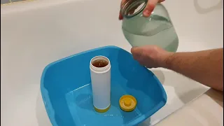 Регенерация картриджа фильтра для смягчения воды.
