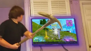 Kid DESTROYS $4000 TV over Fortnite.. (RAGE)