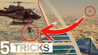 BMX JUMP OUT OF AN HELICOPTERE TO A BUILDING ROOF !