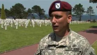 Banners and bunting for Obama visit to French D-Day landings vil