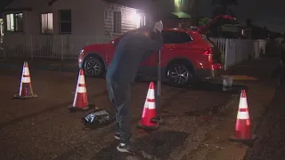 Compton couple filling potholes on their own gets cease and desist from the city