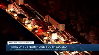 After spending hours trapped, drivers prepare to sleep in cars on I-95