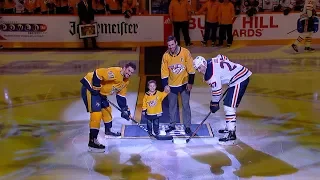 Mike Fisher and his son drop the ceremonial puck