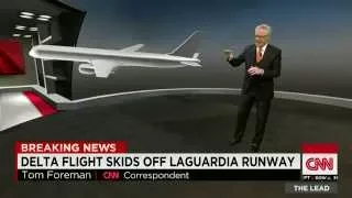 Delta flight skids off LaGuardia runway, stops feet from frigid waters