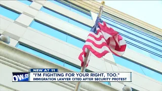 Immigration lawyer cited after security protest