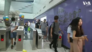Armed Hong Kong Protesters Vandalize Train Station