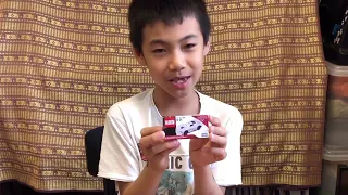 Daniel showed his new Tomica toy car.