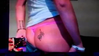 Woman shows off Robbie Williams tattoo on her butt on live TV