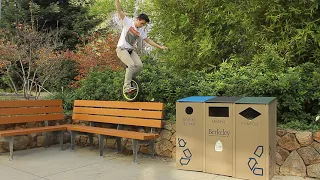 Destroying unicycle rim and falling into fountain