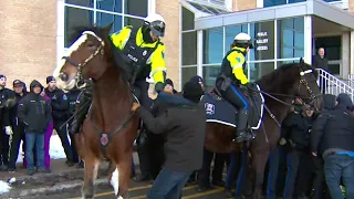 Fish harvesters and police clash outside Newfoundland government building, provincial budget delayed