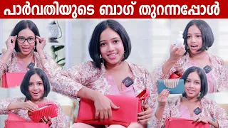 "WHATS IN MY BAG" with PARVATHY AYYAPPADAS | GINGER MEDIA