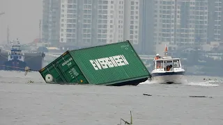 Ship Collision: INTERASIA PURSUIT cargo ship collided with a barge, many containers fell into river