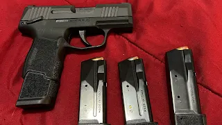 Sig Sauer P365 with a 17 round Macro magazine and 15 round magazine